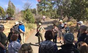 Volunteer Maya Neilsen leading a Rim Trail walk at Walnut Canyon National Monument | NPS Photo